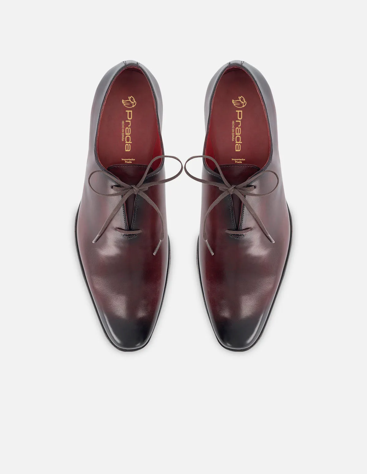 Oxford de piel color vino con bordes sombreados en aerógrafo para hombre.