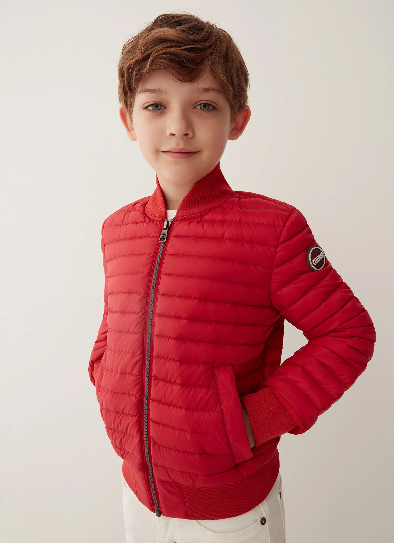 Plumífero estilo bomber acolchado