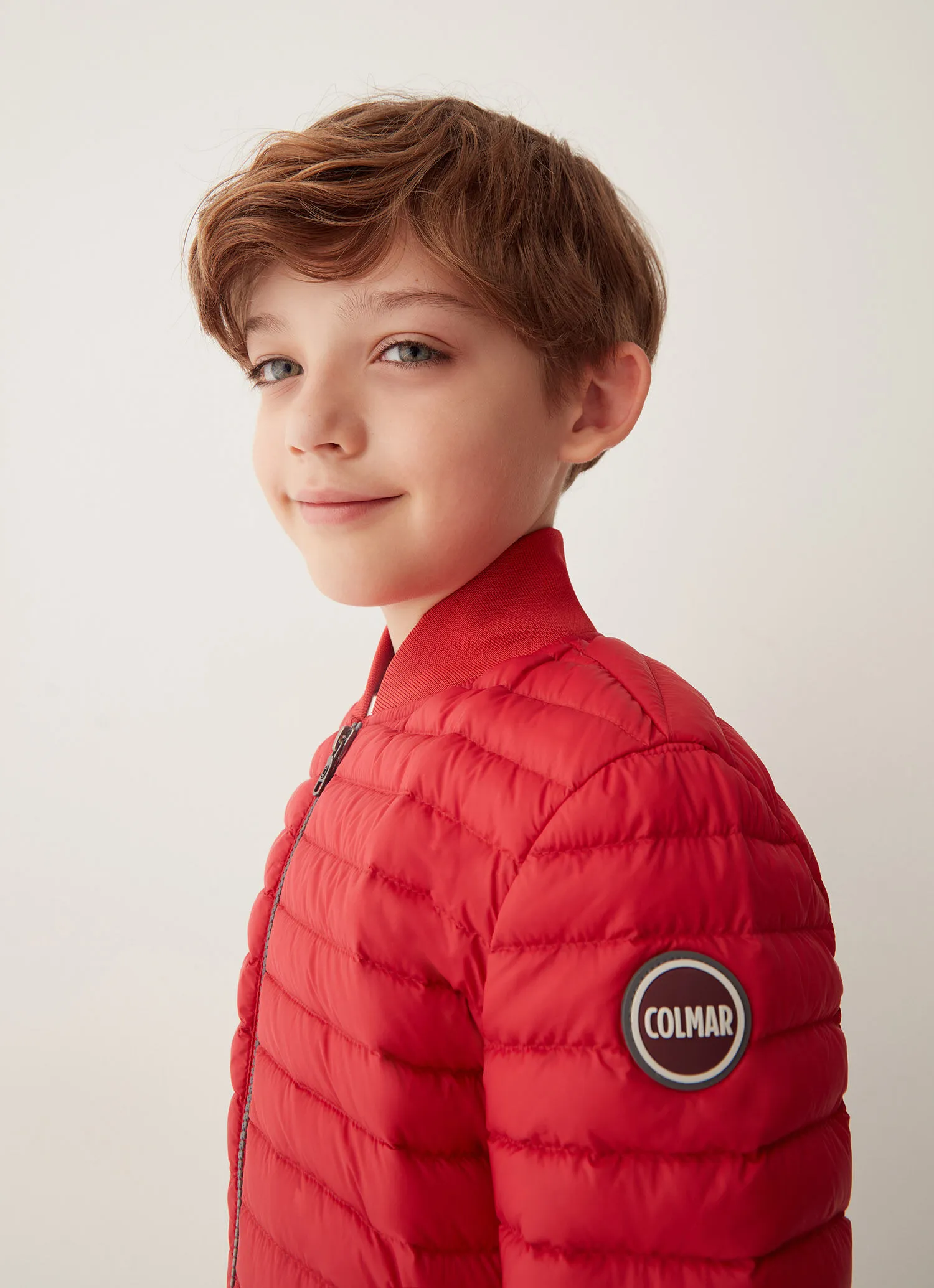 Plumífero estilo bomber acolchado