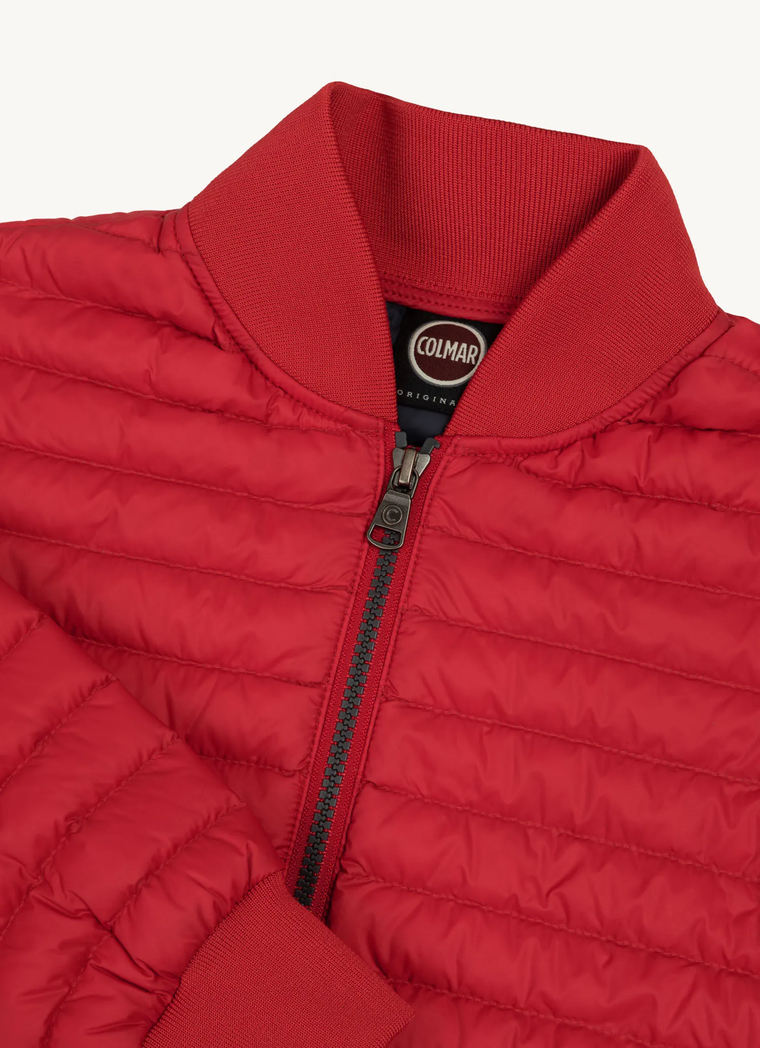 Plumífero estilo bomber acolchado